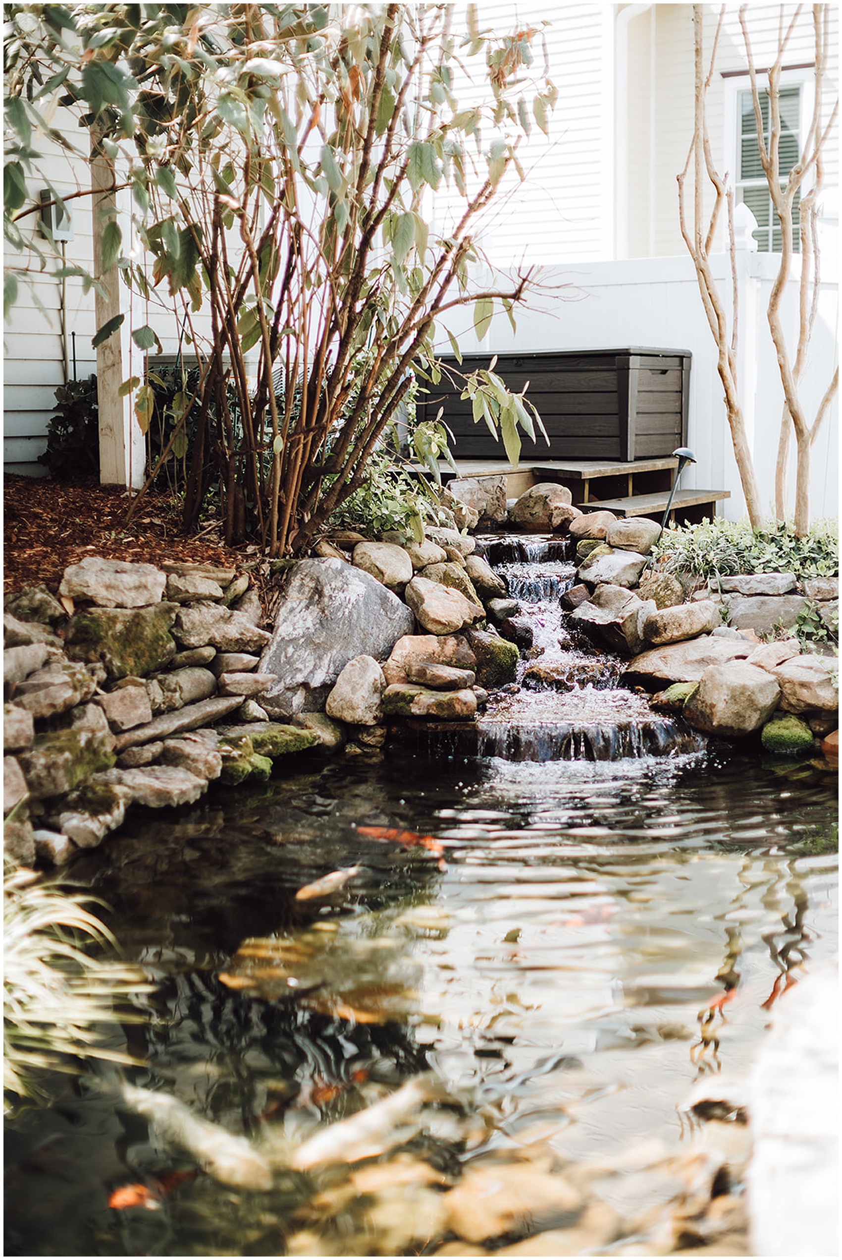 water trickling over rocks in a garden at at CJ's Off the Square wedding venue