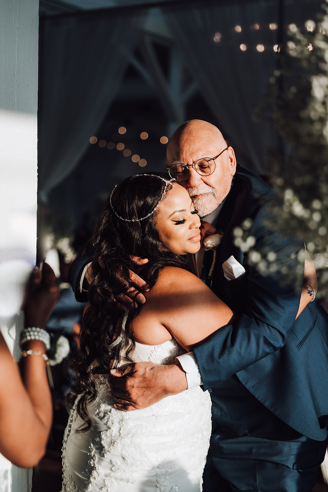 A bride dances with her father on a dance floor cheek to cheek 14Tenn Wedding